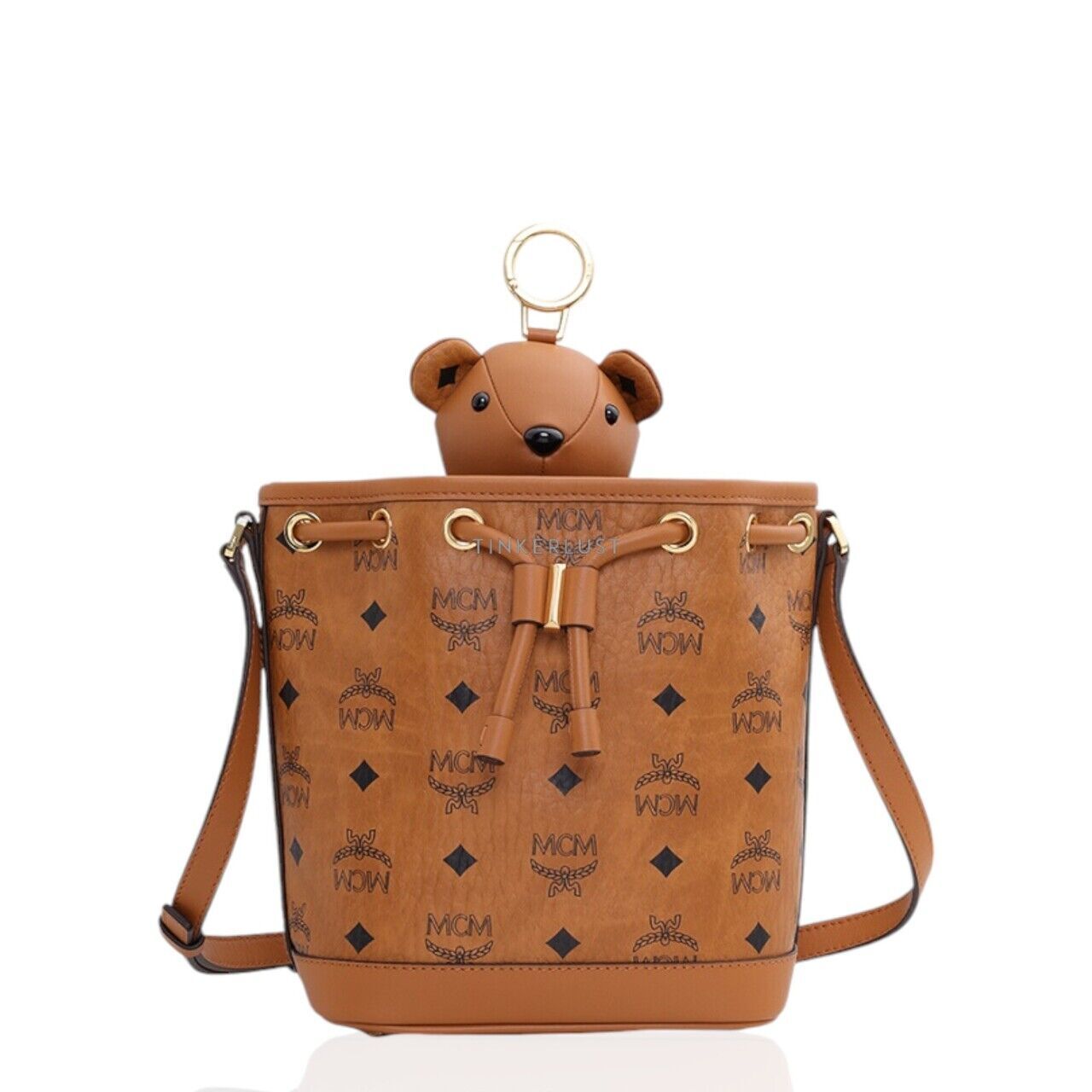 tas shoulder bag MCM Mini Bear Dessau Drawstring Bag in Cognac Visetos Leather Shoulder Bag Tinkerlust