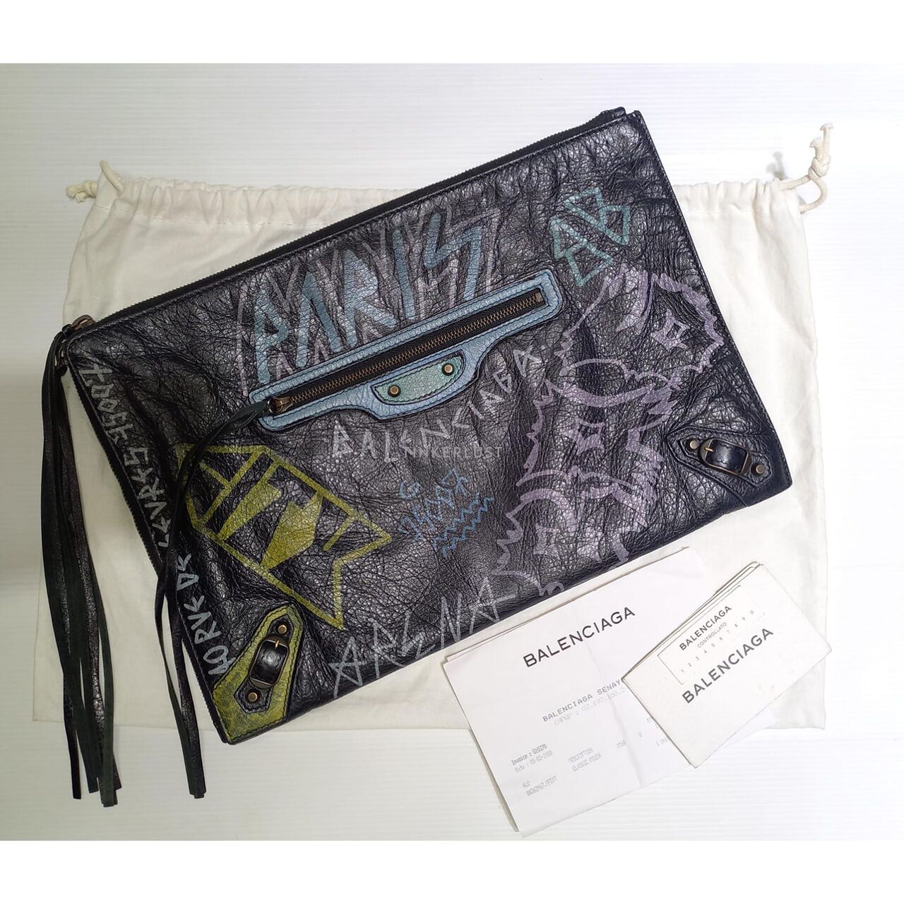 Balenciaga graffiti clutch sale